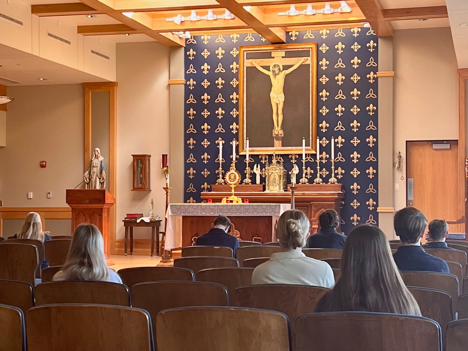 Students spent time in silent prayer before the Most Blessed Sacrament in the chapel of Helias Catholic High School in Jefferson City during the Oct. 17 day of prayer and fasting for peace in the Holy Land.